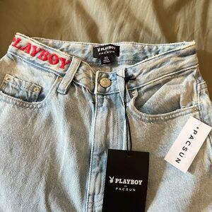 Red Playboy logo distressed jeans